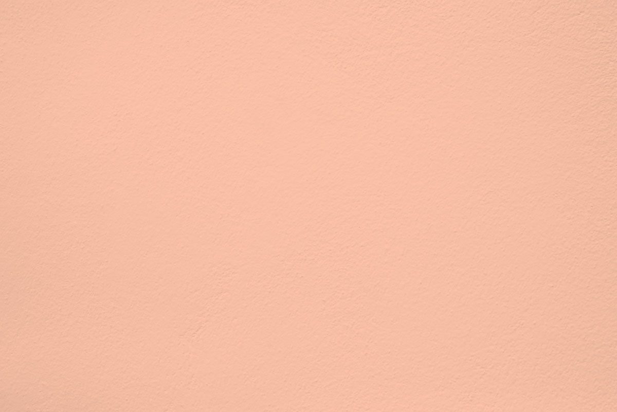 Peinture California love appliquée sur un mur - teinte orange pastel