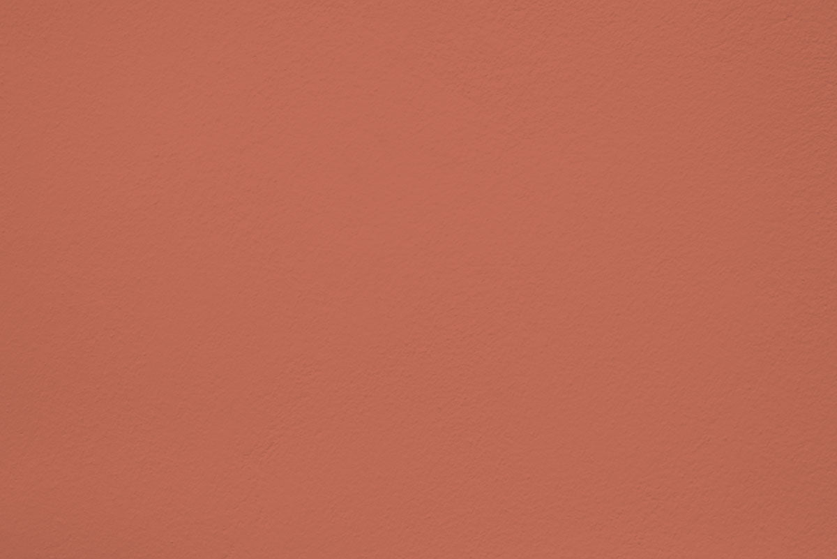 Peinture Spaghetti western appliquée sur un mur - teinte terracotta orange