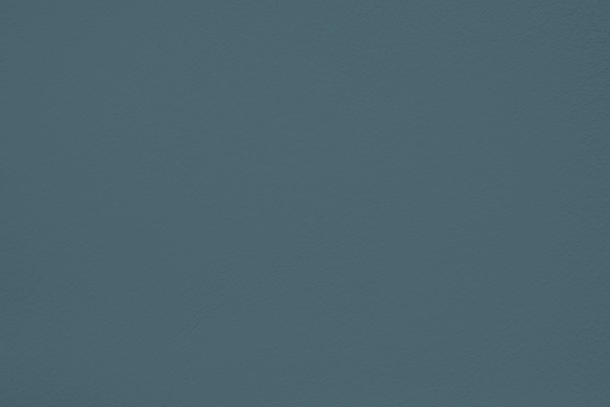Peinture Washed stones appliquée sur un mur - teinte bleu gris